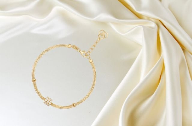 Lắc tay nữ vàng 18K kết hợp charm cá tính dưới 3 triệu