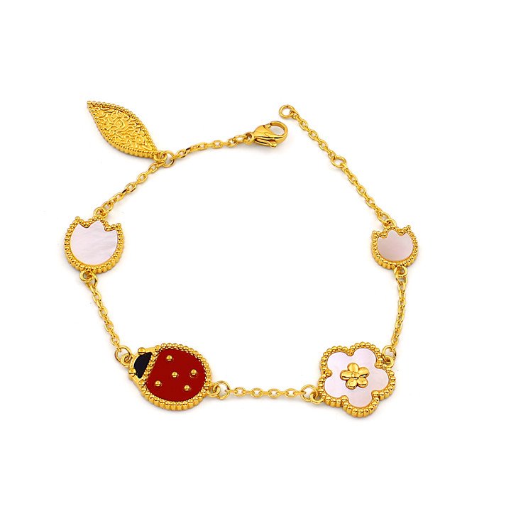 Hình ảnh cận cảnh lắc tay titan con bọ Van Cleef tinh xảo