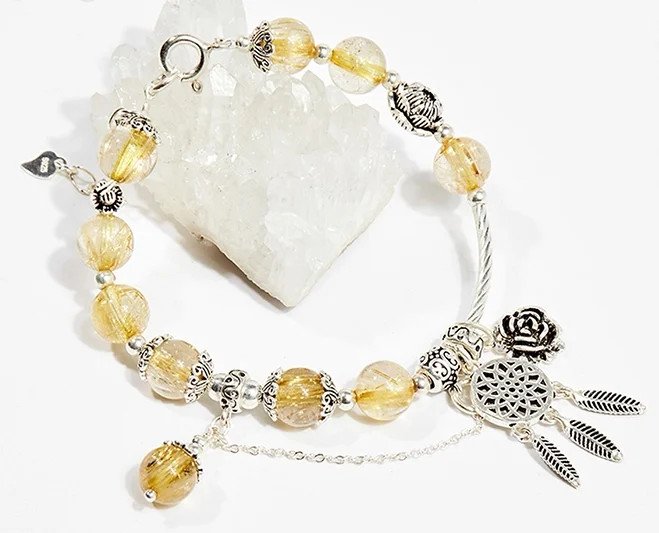 Lắc tay bạch kim nữ đính charm hoa hồng mang ý nghĩa phong thủy tốt lành