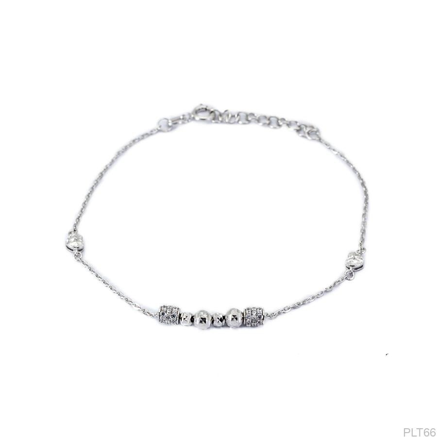 Lắc tay bạch kim nữ với họa tiết lá nhỏ xinh xắn, tôn lên vẻ đẹp dịu dàng và tinh tế.