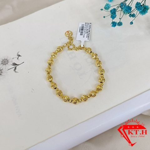 Lắc tay nữ bi tròn vàng 610, một phong cách trang sức duyên dáng.