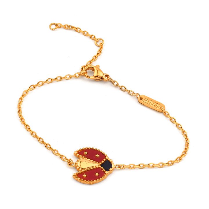 Lắc tay nữ titan van cleef con bọ màu hồng