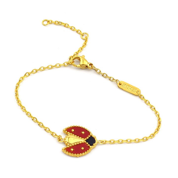 Lắc tay nữ titan van cleef con bọ màu vàng