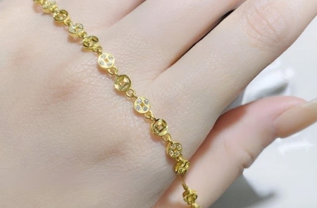 Lắc tay vàng dãy đồng tiền