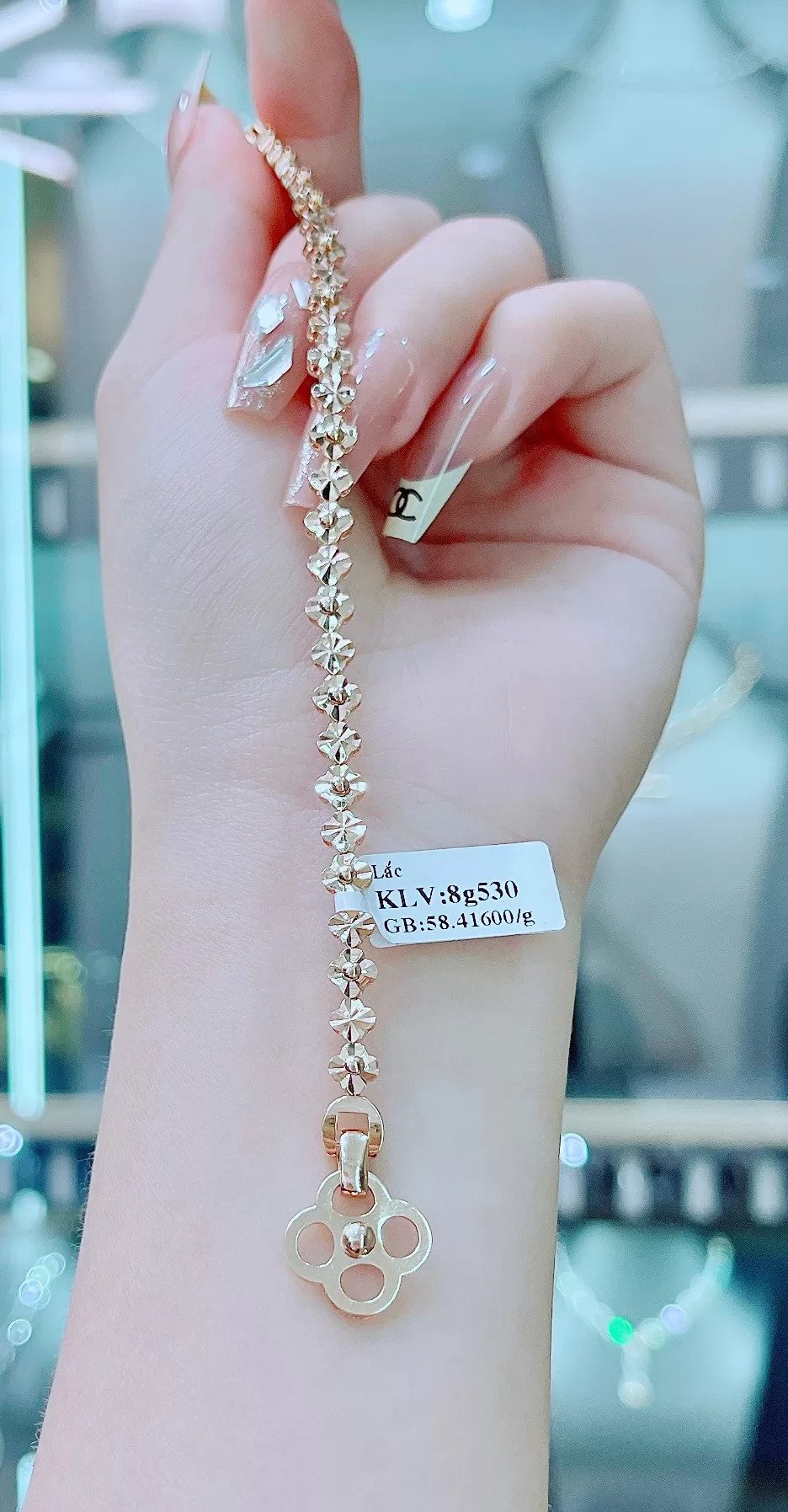 Lắc tay vàng nữ kết hợp hình hoa bốn cánh