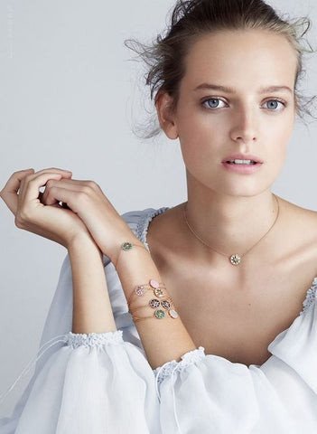 Vòng tay Dior Rose des Vents vàng 18K đính kim cương