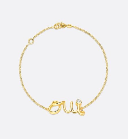 Vòng tay Dior vàng Oui mặt chữ OUI đính kim cương, dây vàng 14K