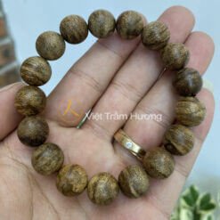 Vòng tay trầm hương tốc banh Philippines 12 ly, với vân gỗ độc đáo và màu sắc tự nhiên