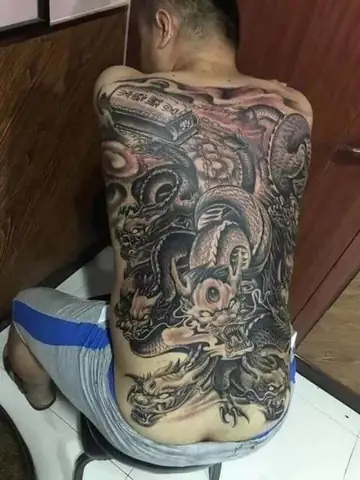 Ý Nghĩa Hình Xăm 9 Con Rồng Kéo Quan Tài