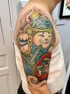 Hình Xăm Daruma Và Mèo Thần Tài Theo Quan Niệm Phong Thủy