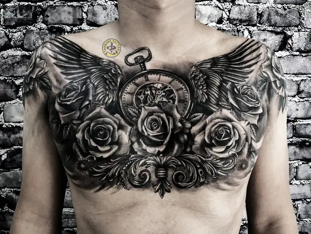 Hình Xăm Đồng Hồ La Mã Với Hoa Hồng Trước Ngực