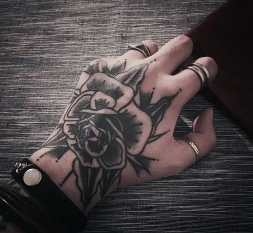 What Are The Popular Designs For Lotus Flower Tattoos On The Palm Of The Hand?