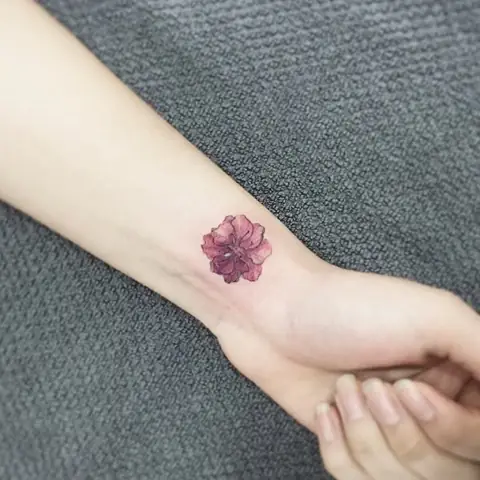 What Are The Popular Designs For Lotus Flower Tattoos On The Palm Of The Hand?