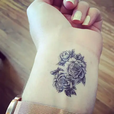 What Are The Popular Designs For Lotus Flower Tattoos On The Palm Of The Hand?