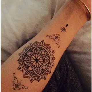 What Are Some Beautiful Flower Pattern Tattoos For Men On The Forearm?