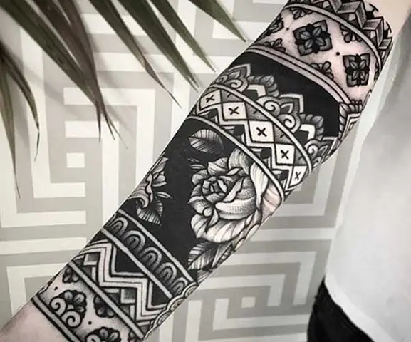 What Are Some Beautiful Flower Pattern Tattoos For Men On The Forearm?