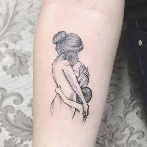 Hình Xăm Mẹ Bồng 2 Con Hình Xăm Mẹ Bồng 2 Con