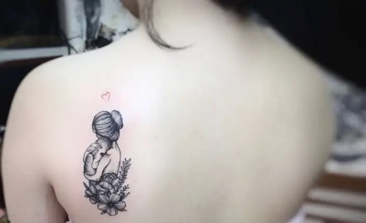 Hình Xăm Mẹ Bồng Con Sau Lưng Hình Xăm Mẹ Bồng Con Sau Lưng