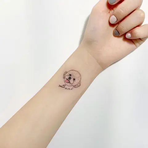 Hình Xăm Chú Cún Ở Cổ Tay Nữ