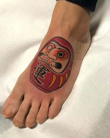 Hình Xăm Chân Búp Bê Daruma Mini