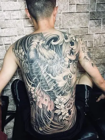Khám Phá Bộ Sưu Tập Hình Xăm Cá Chép Mặt Quỷ Kín Lưng Ấn Tượng Nhất
