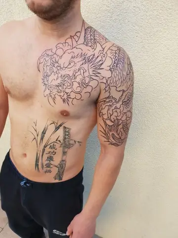 Các Mẫu Hình Xăm Rồng Vắt Vai Đẹp Nhất